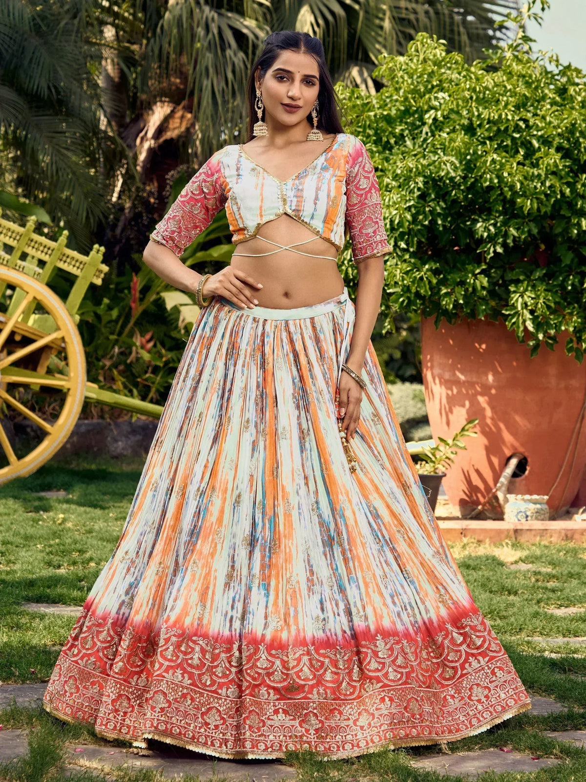 Colorful printed lehenga choli with gold embroidery, perfect for Indian ethnic wear occasions