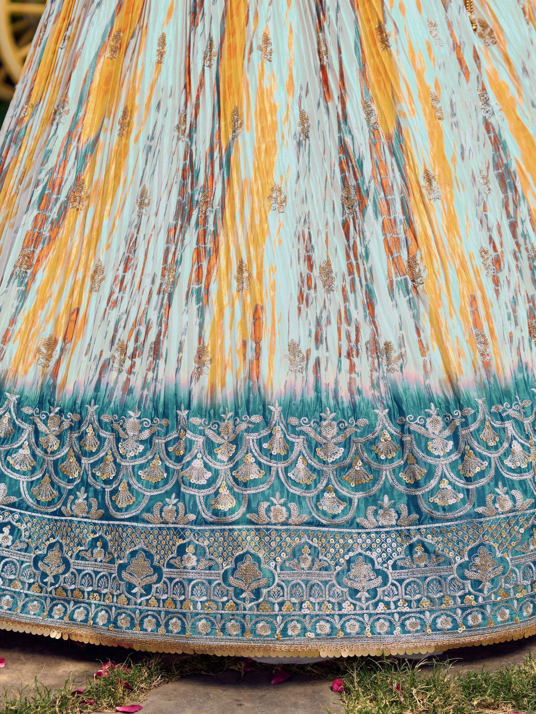 Turquoise and gold embroidered lehenga skirt with floral motifs and pleated design, perfect for Indian ethnic wear.