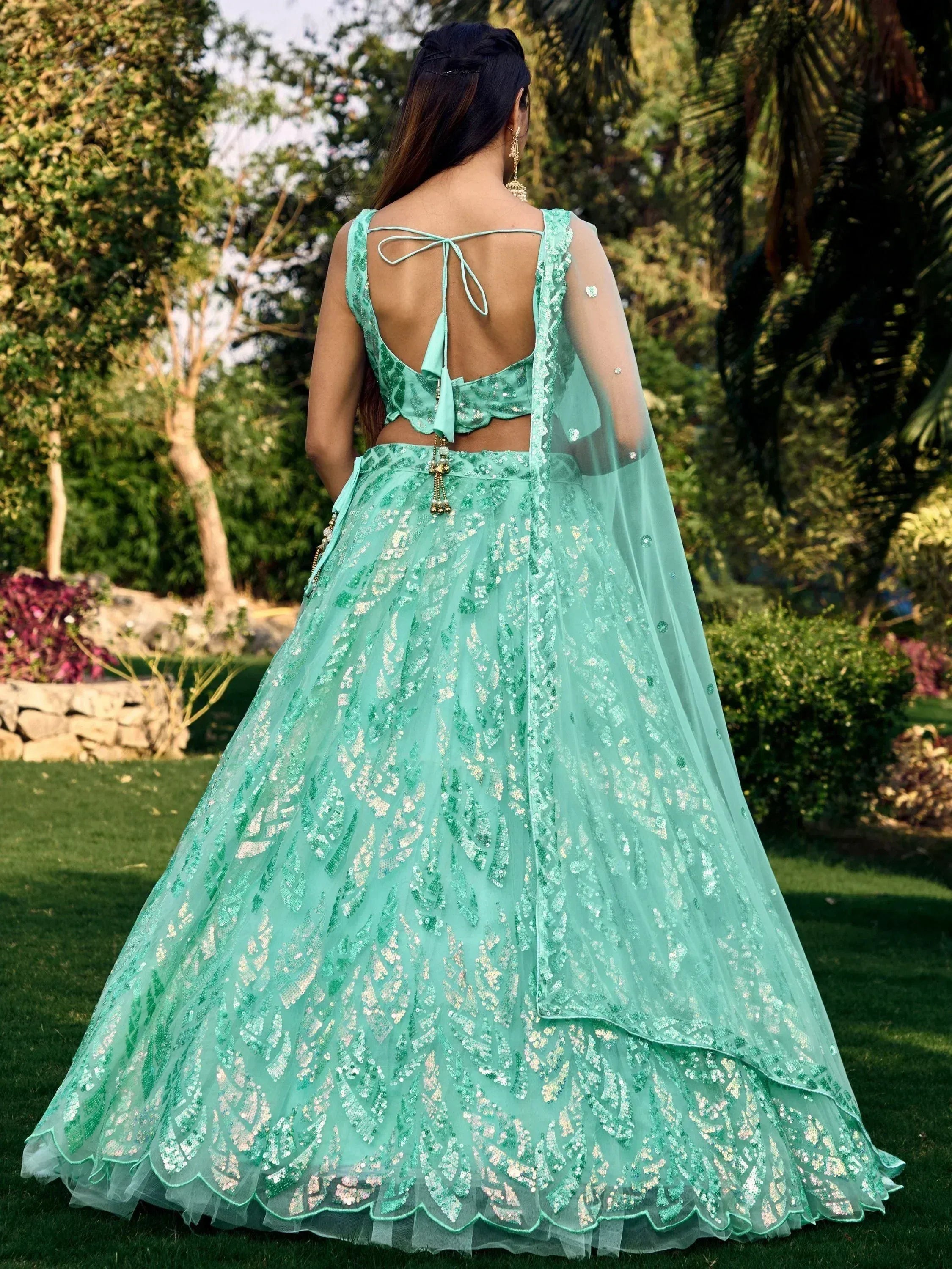 Mint green sequin lehenga choli with back tie blouse, perfect for Indian ethnic wear events