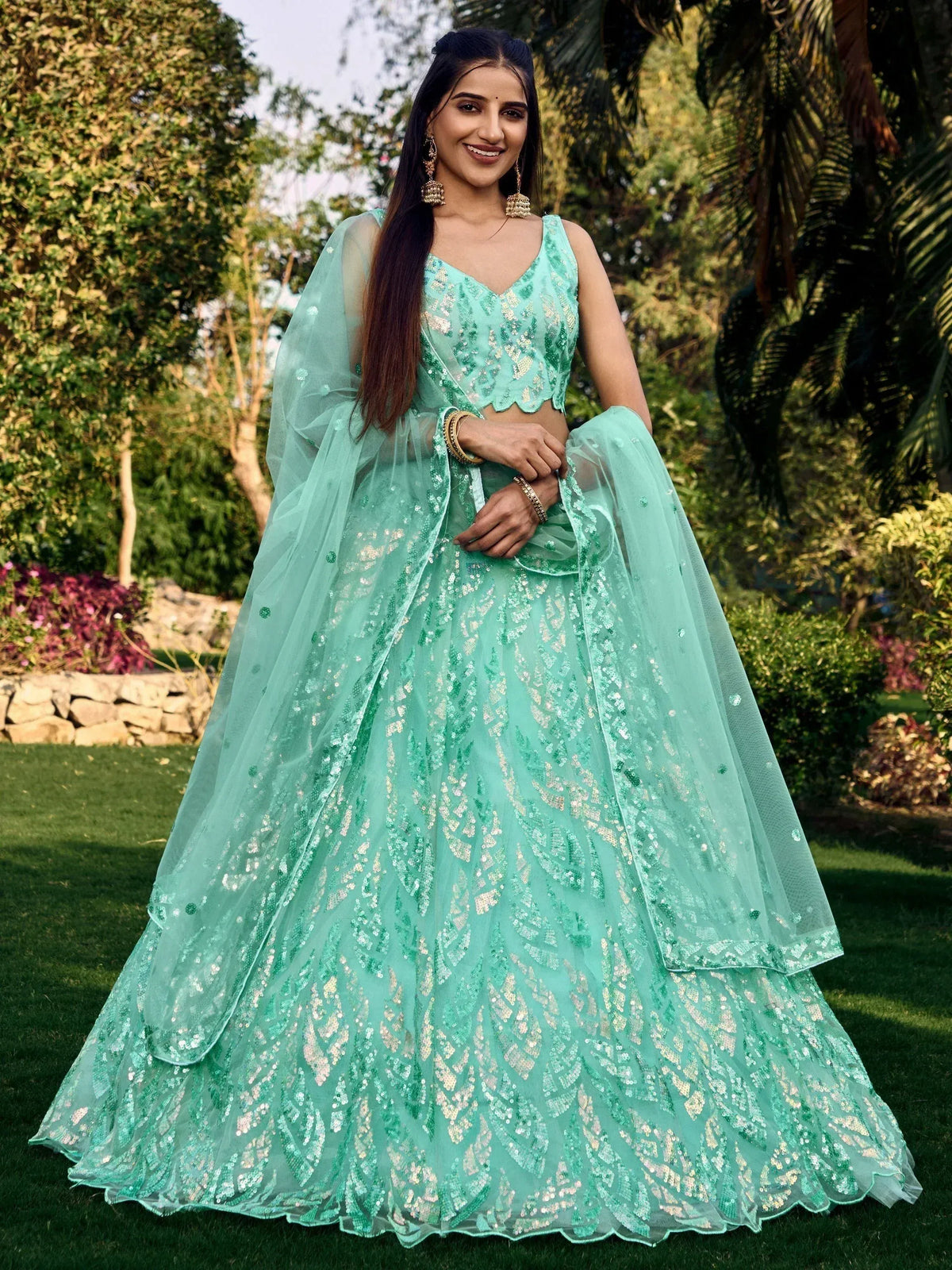 Mint green sequin lehenga choli with sheer dupatta, perfect for Indian ethnic wear events