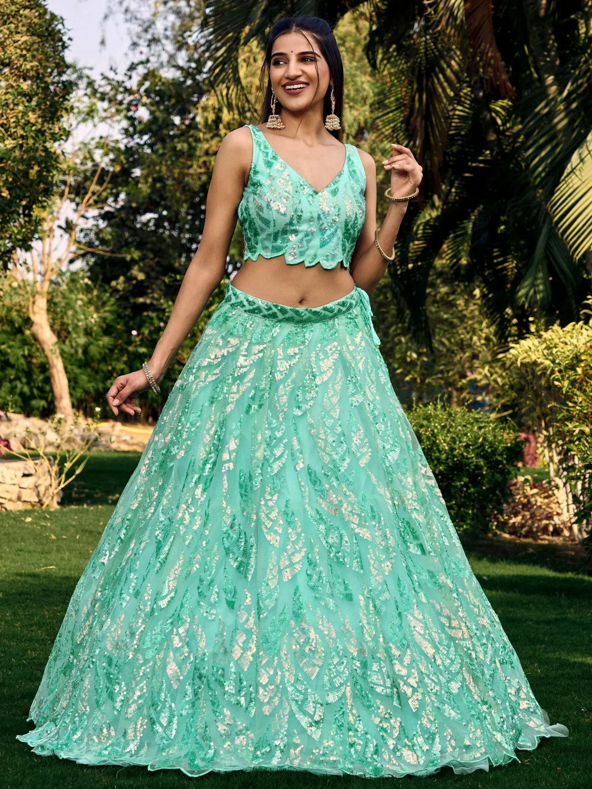 Mint green sequin lehenga choli with scalloped crop top, perfect for Indian ethnic wear events