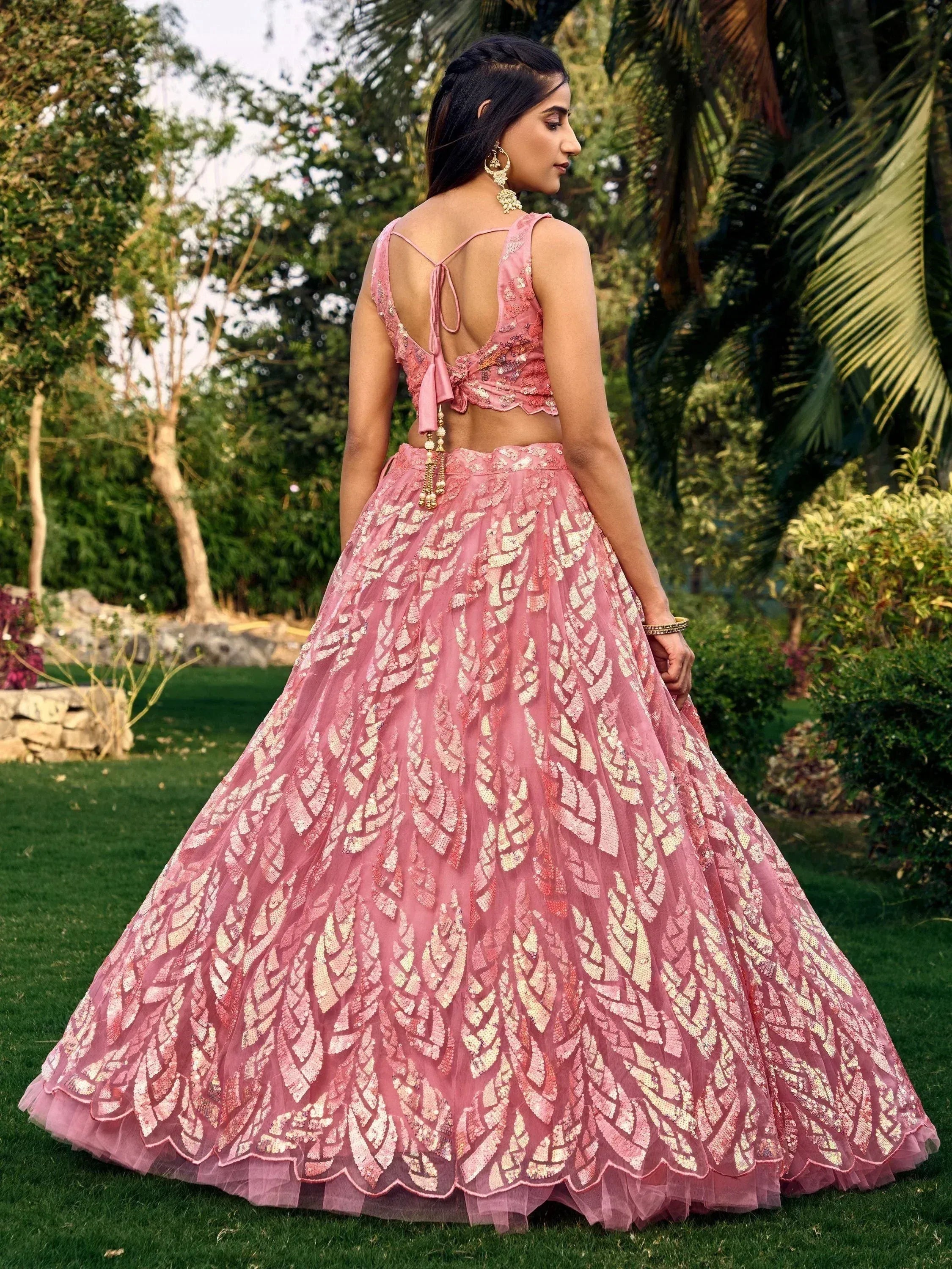 Pink sequin lehenga choli with back tie blouse, perfect for Indian weddings and festive occasions