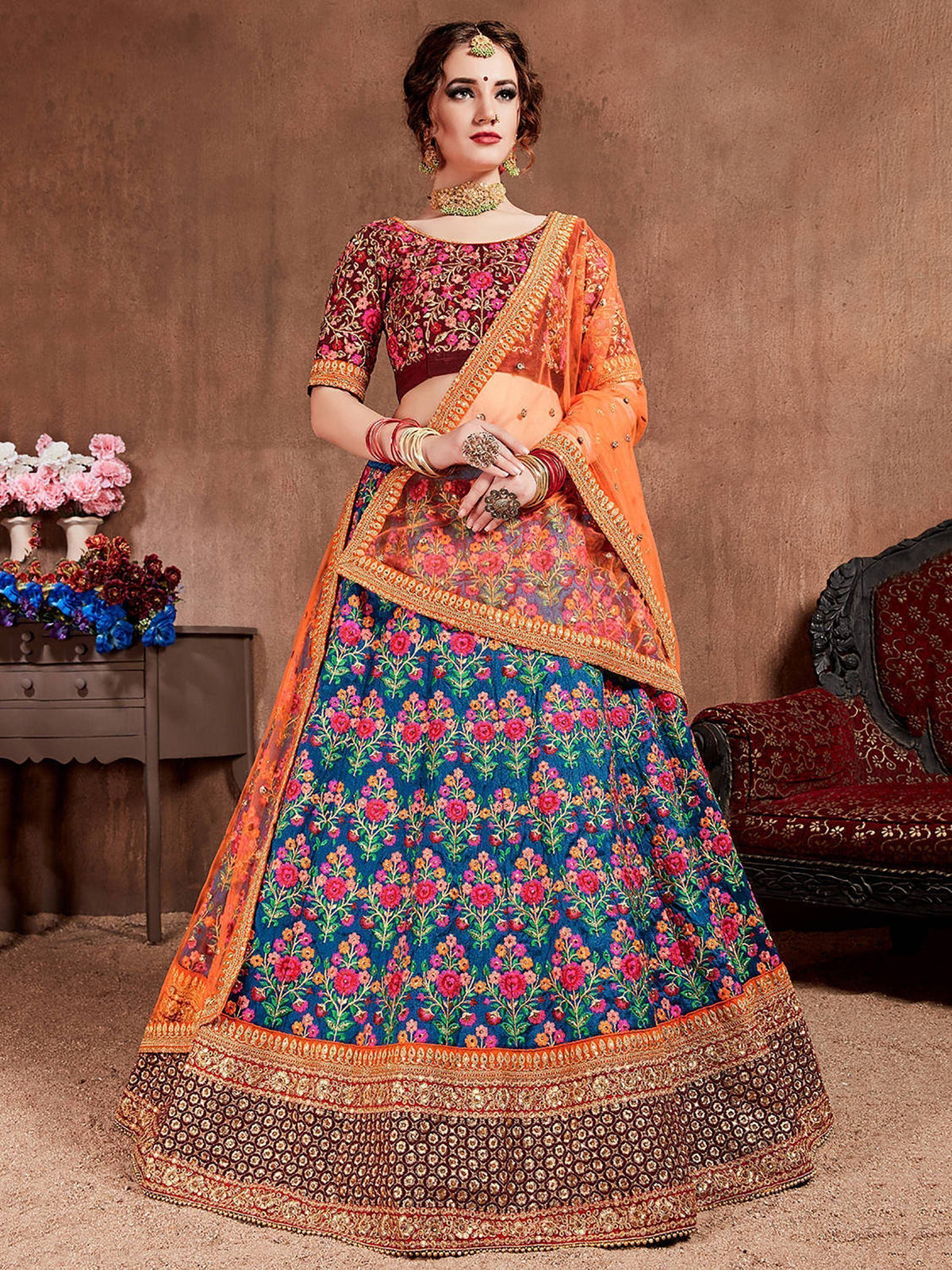 Designer lehenga choli with floral embroidery, perfect for Indian weddings and festive occasions.