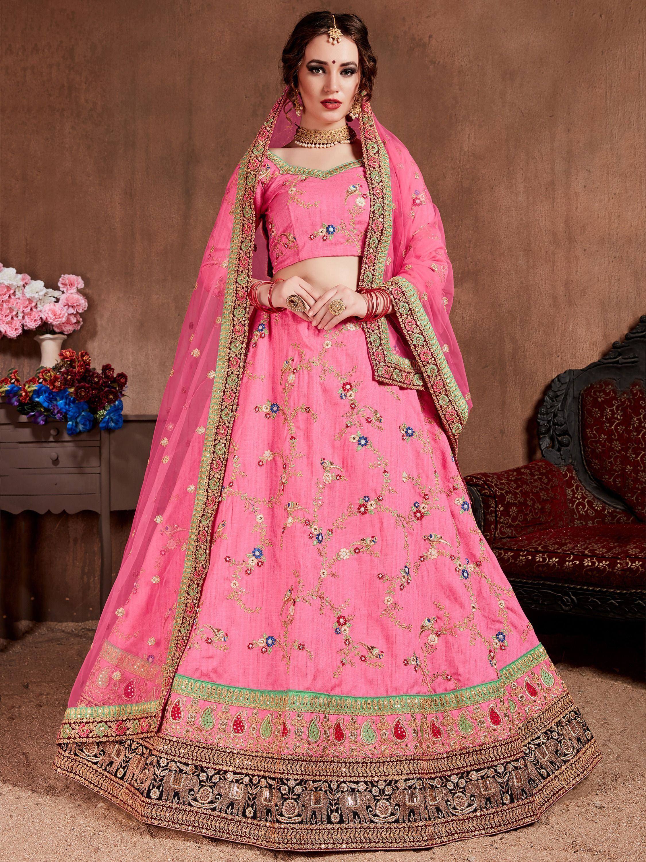 Pink embroidered lehenga choli with floral and elephant motifs, perfect for Indian weddings and festive occasions.