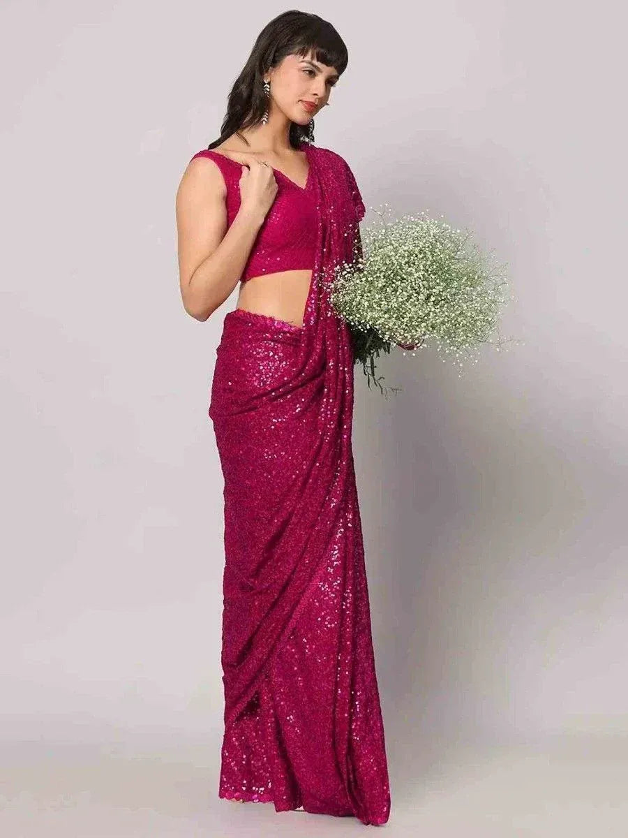 Sparkling magenta sequin saree with matching blouse, perfect for Indian ethnic events and weddings