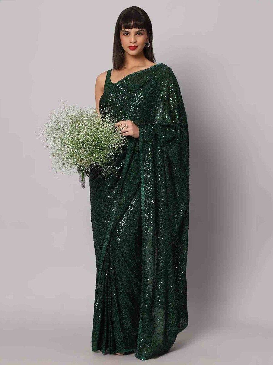 Emerald green sequin saree with one-shoulder blouse, perfect for Indian ethnic events and parties.