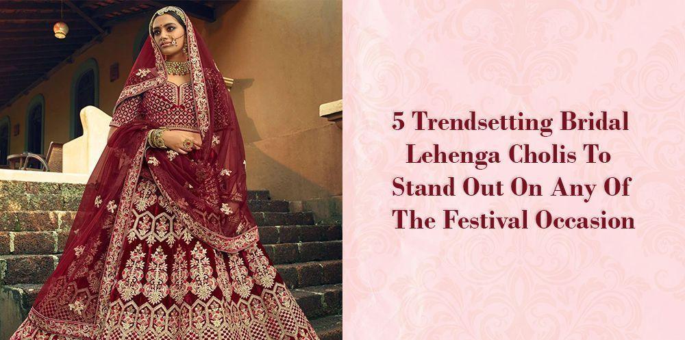 Woman in maroon bridal lehenga choli with gold embroidery, Ethnic Plus festival fashion