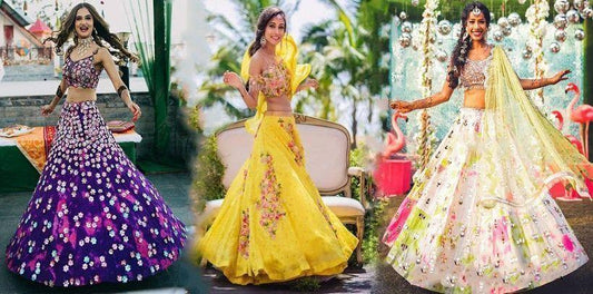 Women wearing colorful floral lehenga choli outdoors, perfect for summer weddings at Ethnic Plus