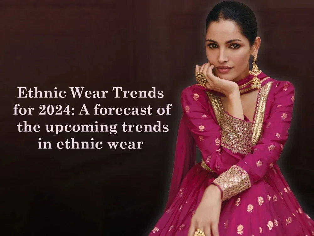 Woman in magenta embroidered ethnic gown showcasing 2024 Indian ethnic wear trends