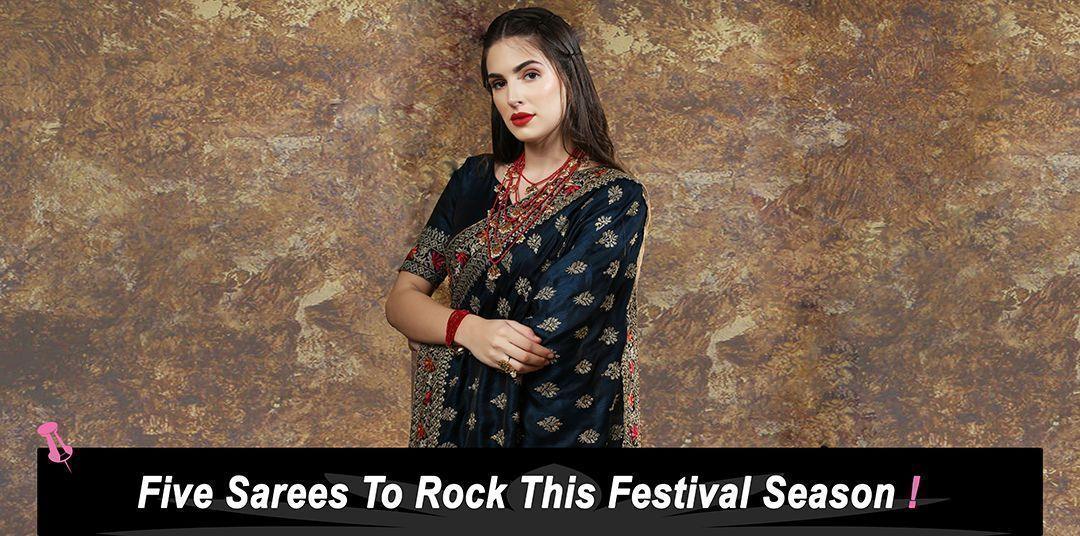 Woman in elegant black and gold designer saree, festive ethnic wear for women by Ethnic Plus
