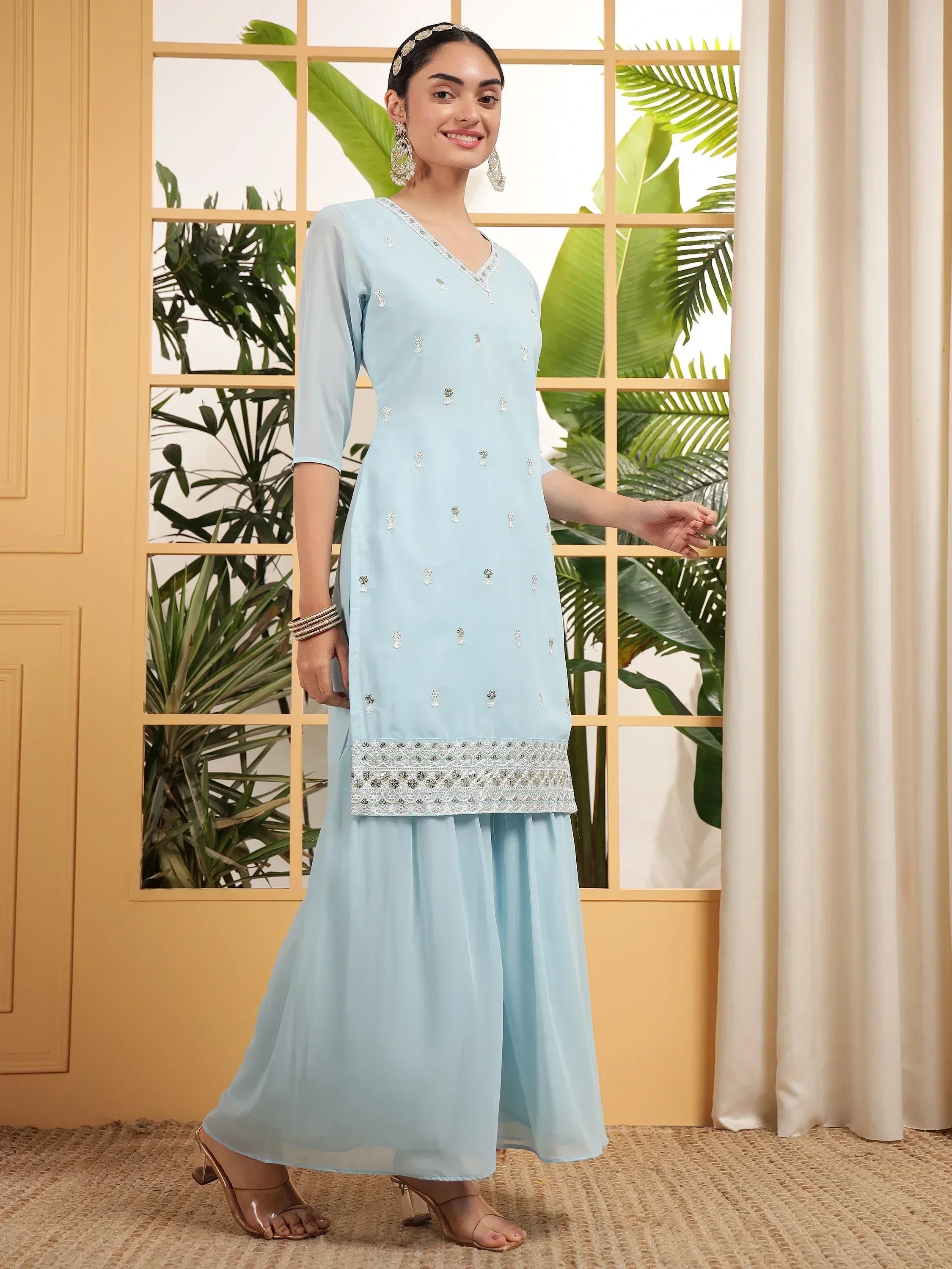 Light blue embroidered ethnic kurta with palazzo pants, perfect for Indian wear occasions