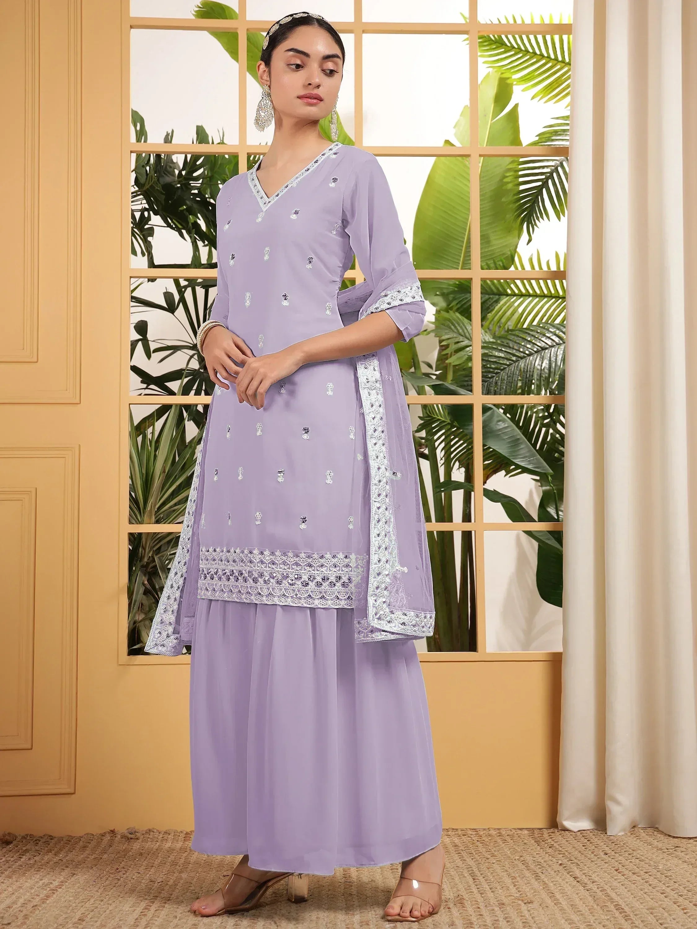 Lavender ethnic salwar kameez with white embroidery and dupatta, perfect for festive occasions
