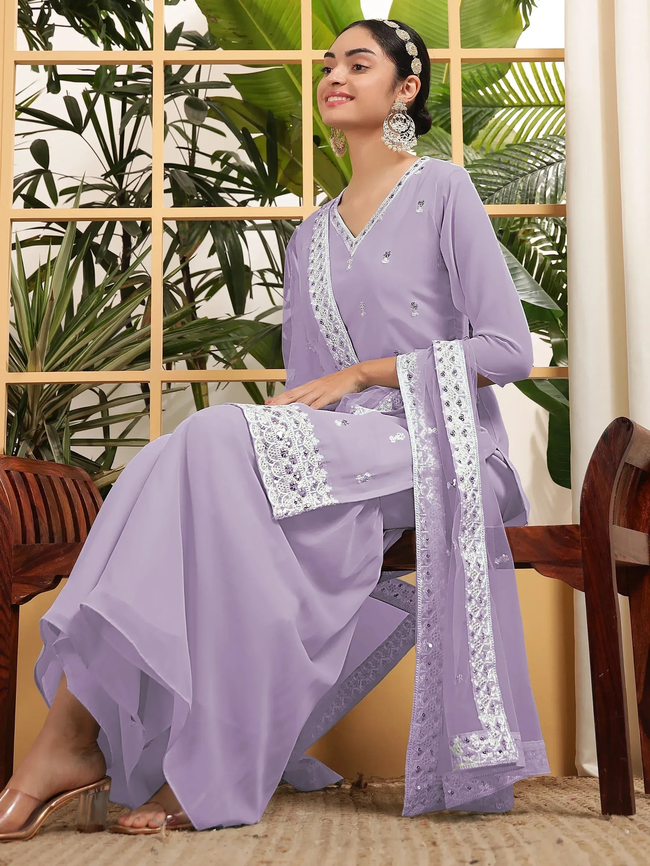 Lavender ethnic salwar kameez with silver embroidery, perfect for Indian festive wear and designer occasions.