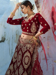 Bewitching Maroon Zari Embroidery Velvet Bridal Wear Lehenga Choli