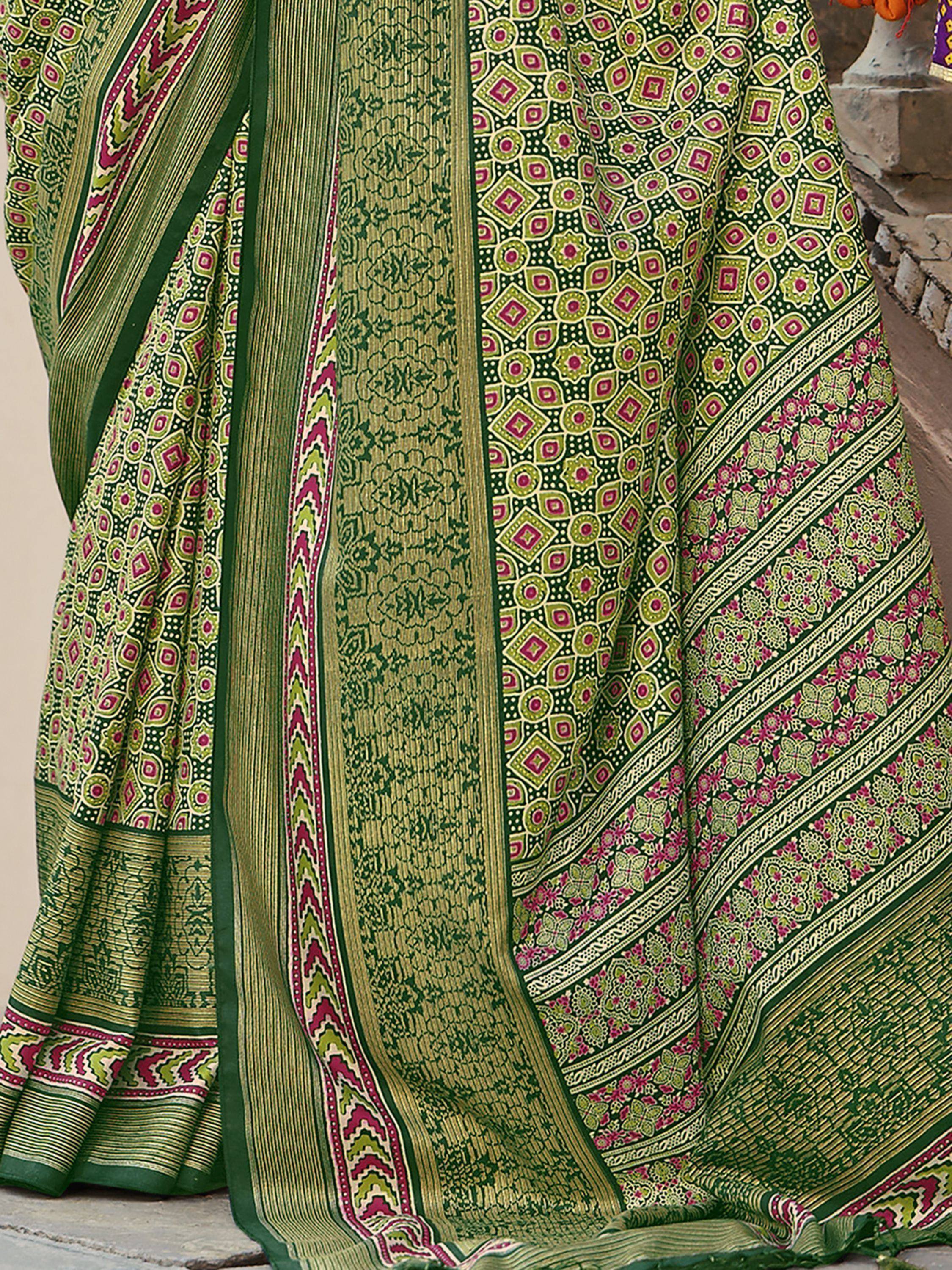 Green printed saree with pink and gold geometric patterns, ethnic Indian wear