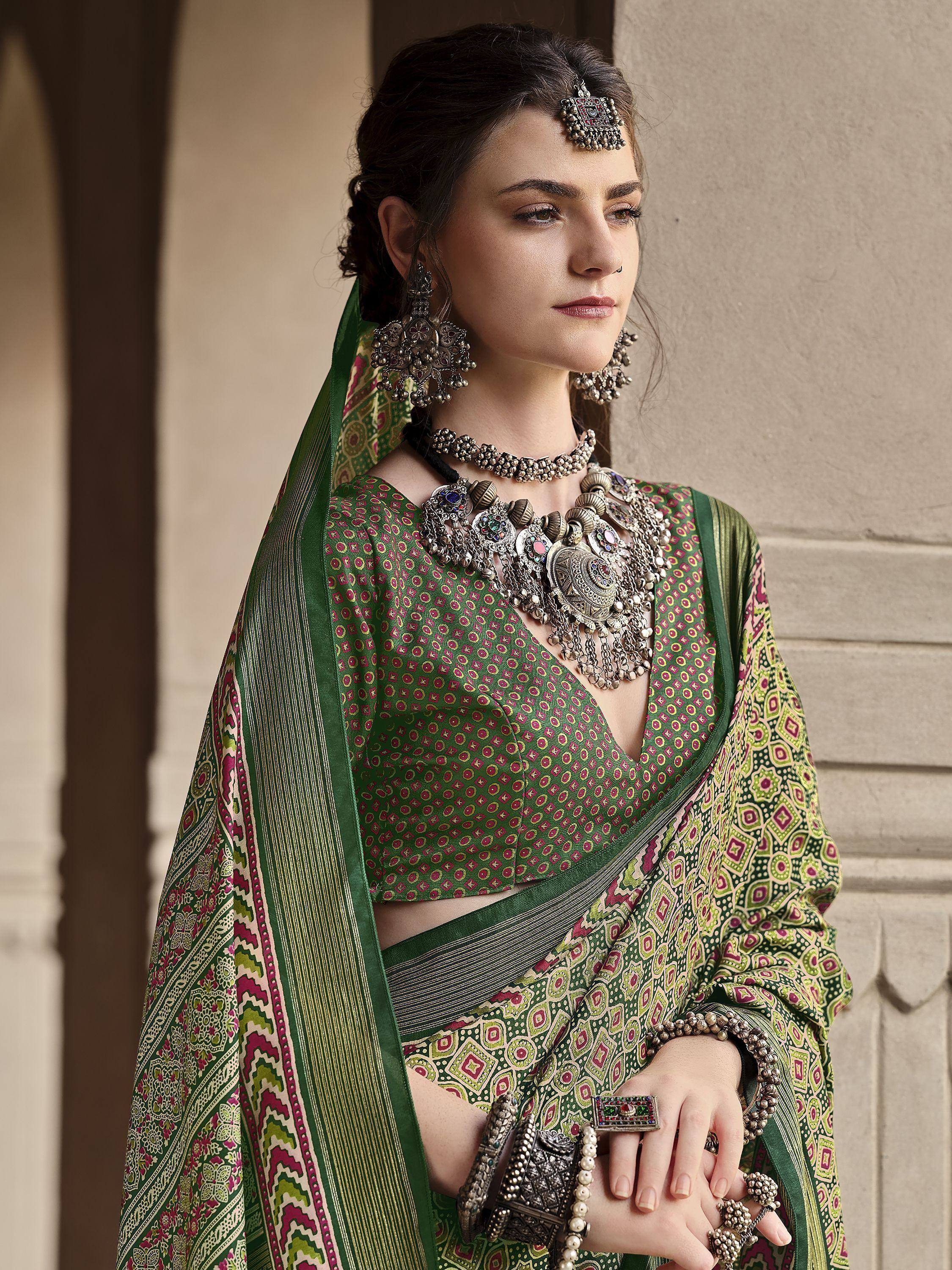 Green printed saree with ethnic jewelry, perfect for Indian ethnic wear occasions