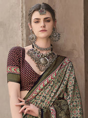 Lovable Olive Green Patola Printed Silk Event Wear Saree With Blouse