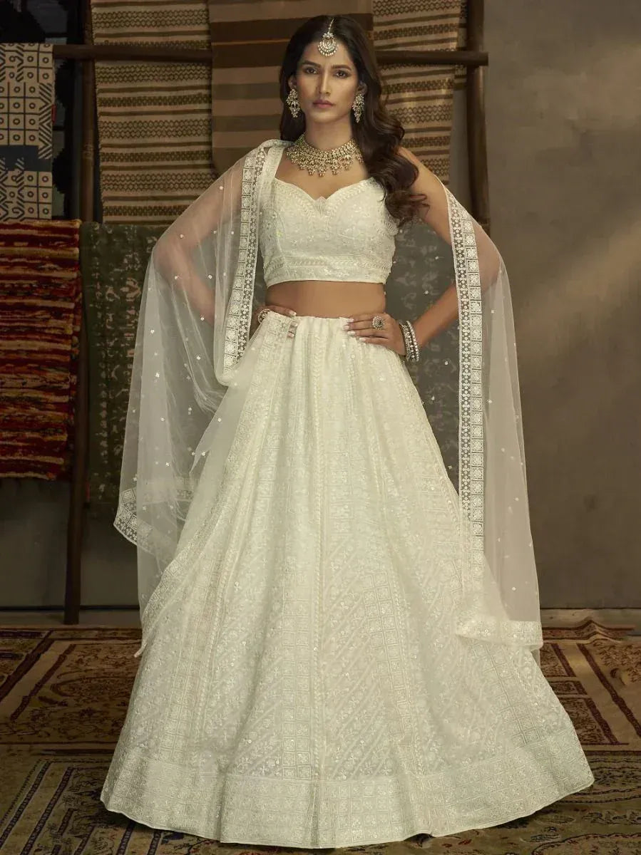 White embroidered lehenga choli with dupatta, perfect for Indian weddings and ethnic events