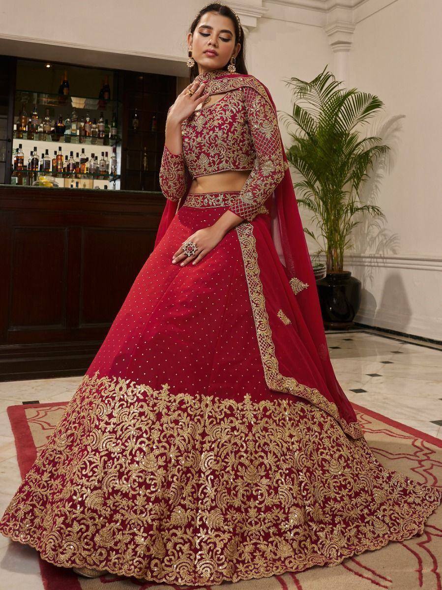 Pink lehenga with white floral embroidery and border detailing, ideal for Indian ethnic wear occasions