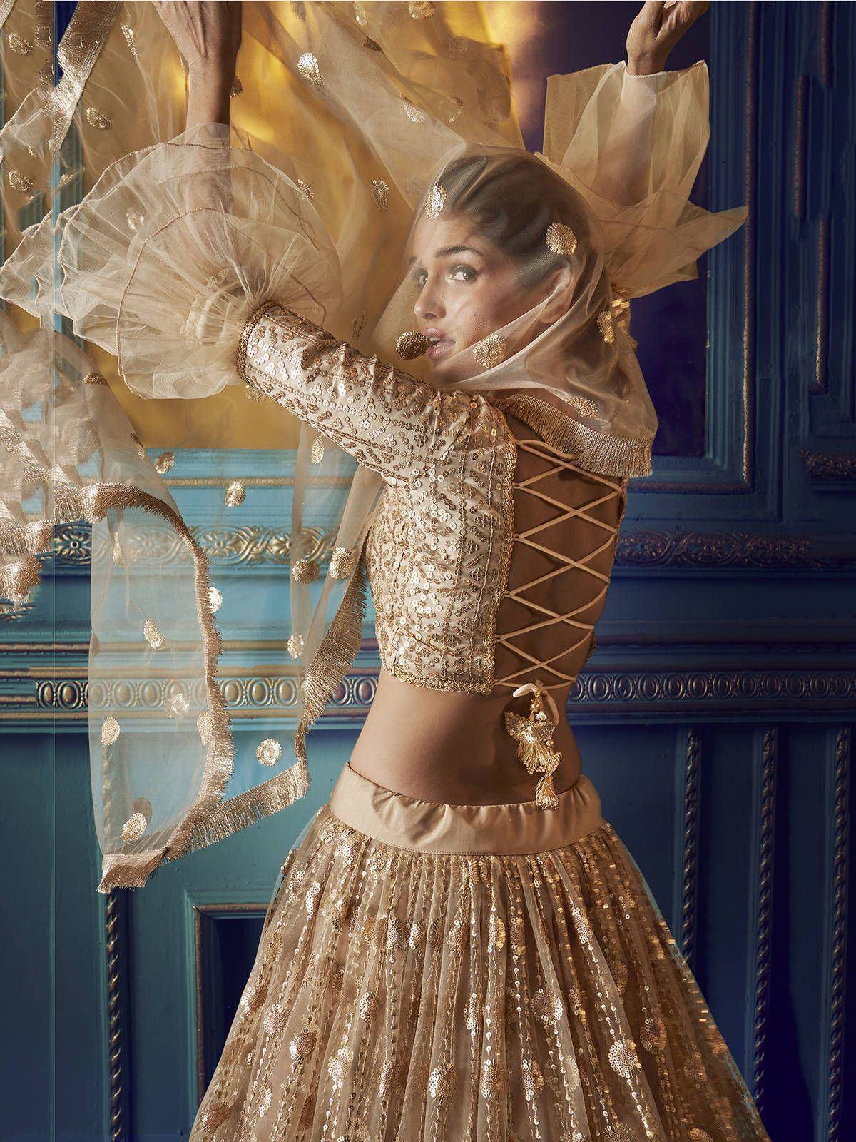 Gold sequin lehenga choli with lace-up back and sheer dupatta, ethnic Indian wedding wear
