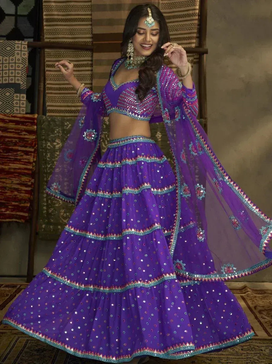 Purple designer lehenga choli with mirror work and embroidery, perfect for Indian ethnic wear occasions