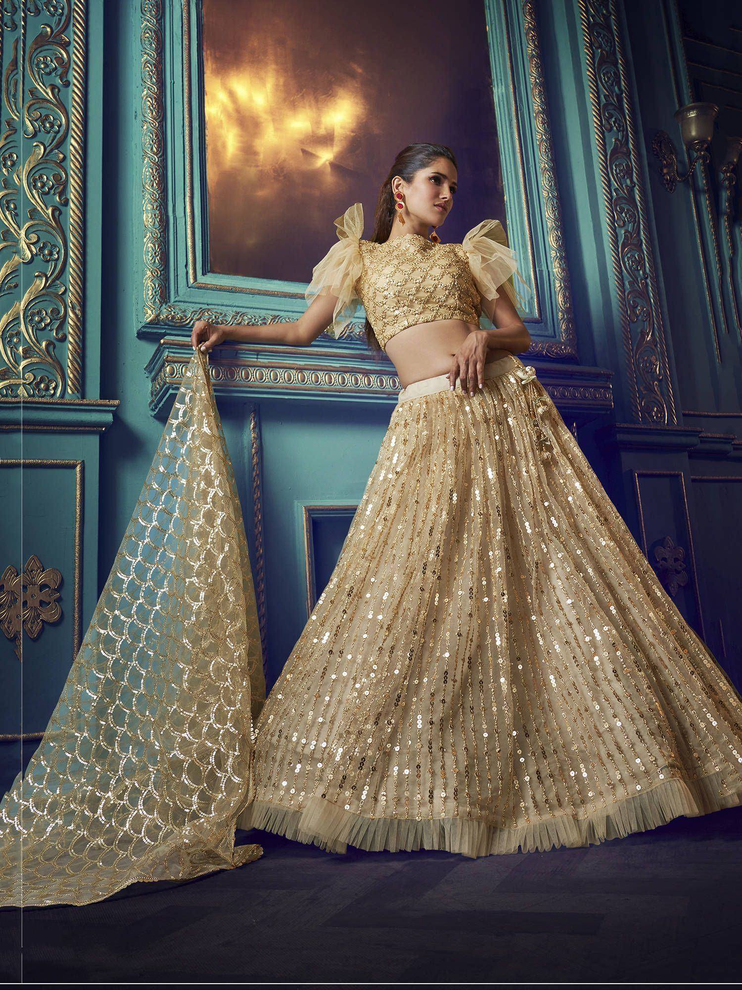 Golden sequin lehenga choli with puff sleeves and matching dupatta, elegant Indian ethnic wear