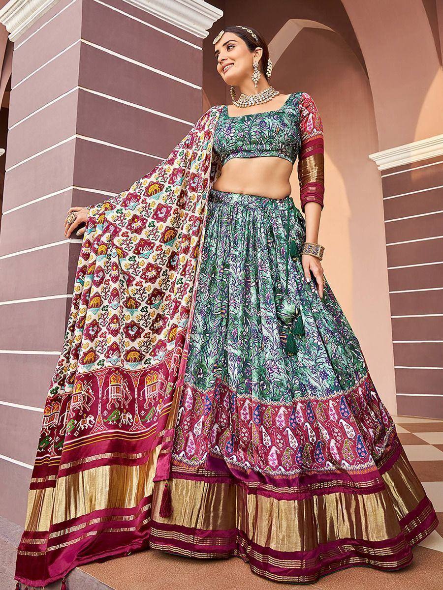 Green and maroon printed lehenga choli with elephant motifs, perfect for Indian ethnic wear occasions