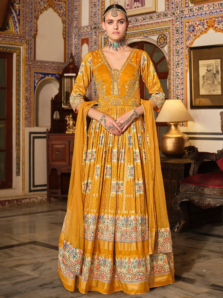 Charming Yellow Bandhani Printed Silk Haldi Wear Gown With Dupatta