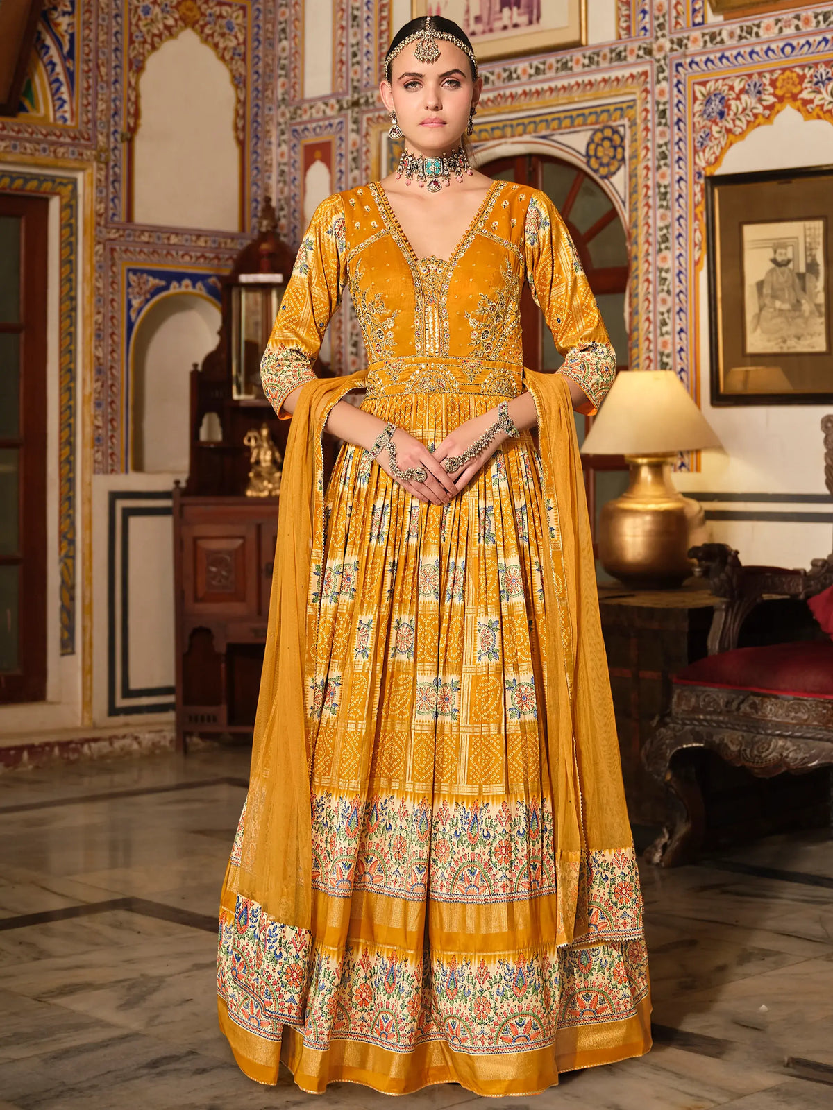 Charming Yellow Bandhani Printed Silk Haldi Wear Gown With Dupatta