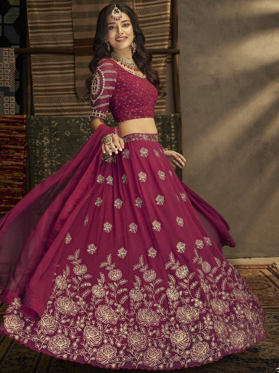 Maroon designer lehenga choli with gold floral embroidery, perfect for Indian ethnic occasions