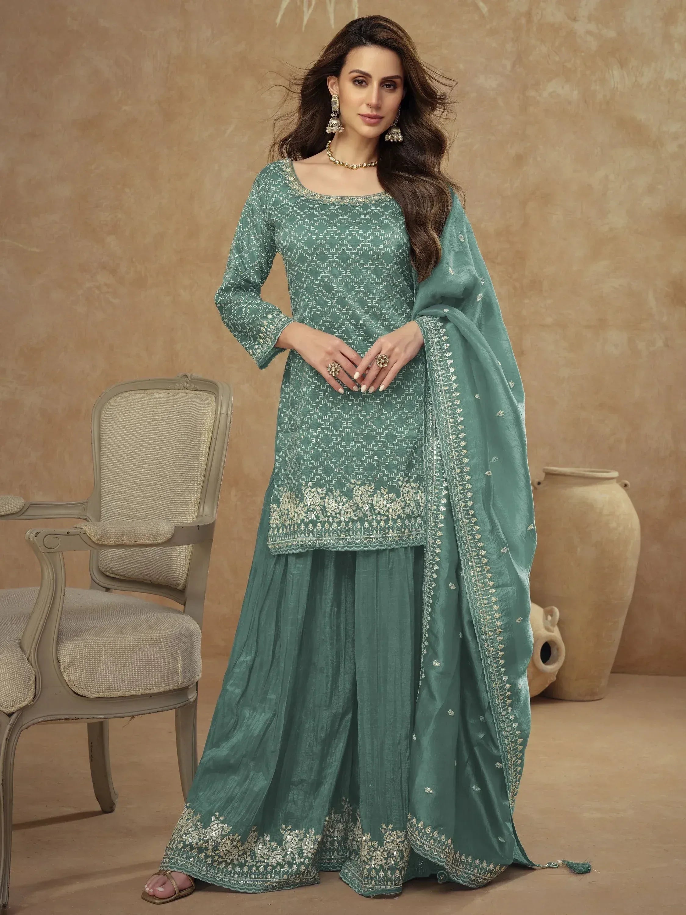 Teal embroidered salwar kameez with geometric print, dupatta, and palazzo pants for ethnic wear