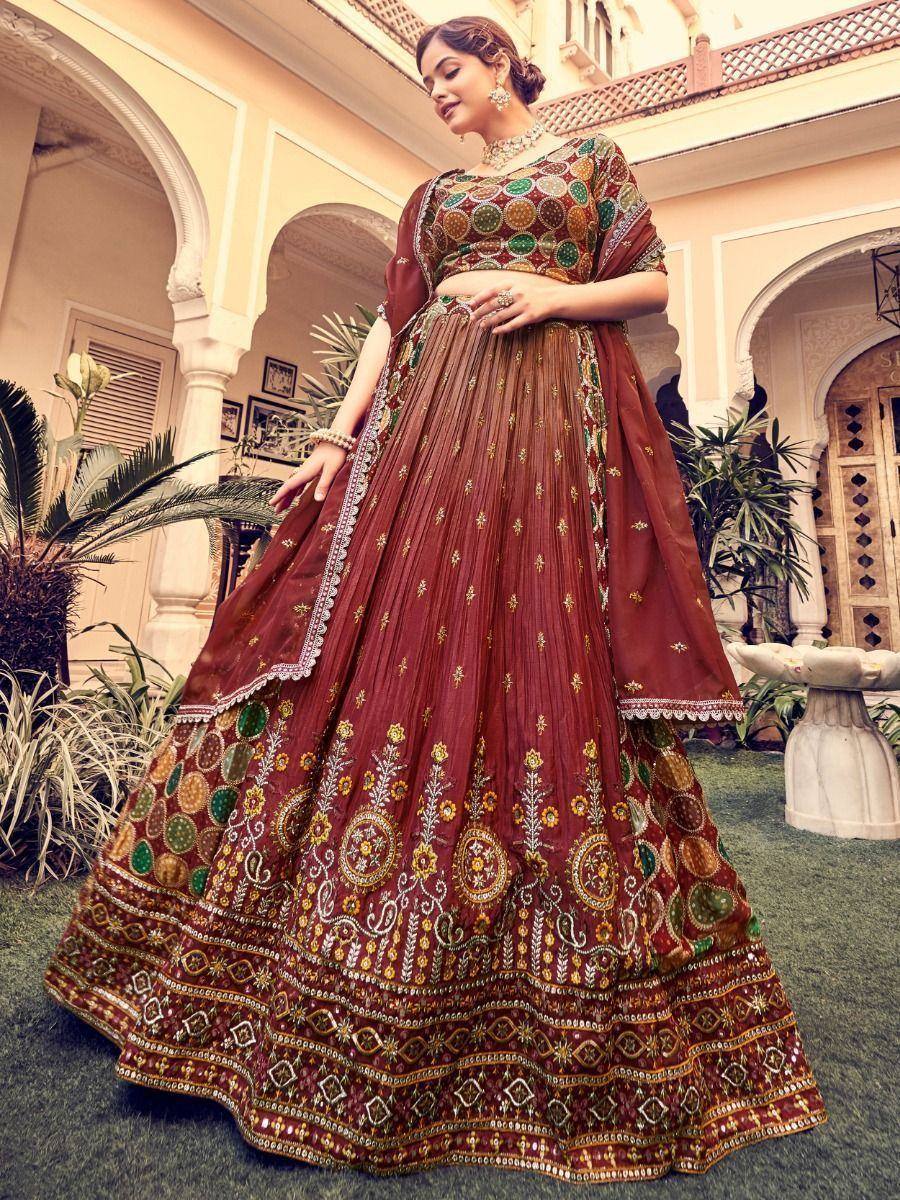 Maroon embroidered lehenga choli with mirror work, perfect for Indian ethnic wear and festive occasions