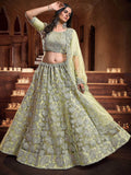 Enchanting Light Green Sequins Embroidered Net Wedding Wear Lehenga Choli