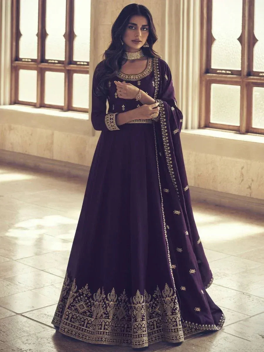 Elegant purple anarkali with gold embroidery, perfect for Indian ethnic occasions and festive wear.