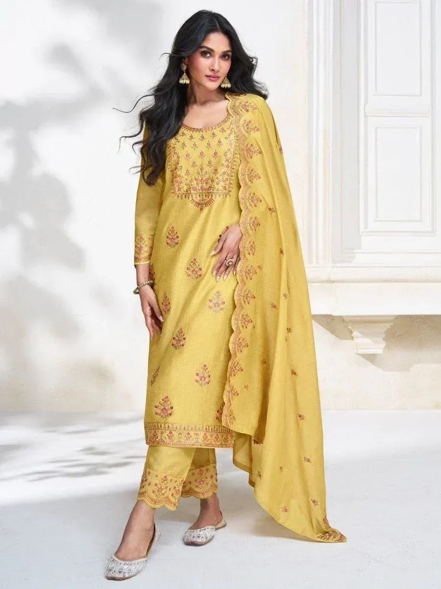 Yellow embroidered salwar kameez with floral patterns and matching dupatta, stylish ethnic wear for women