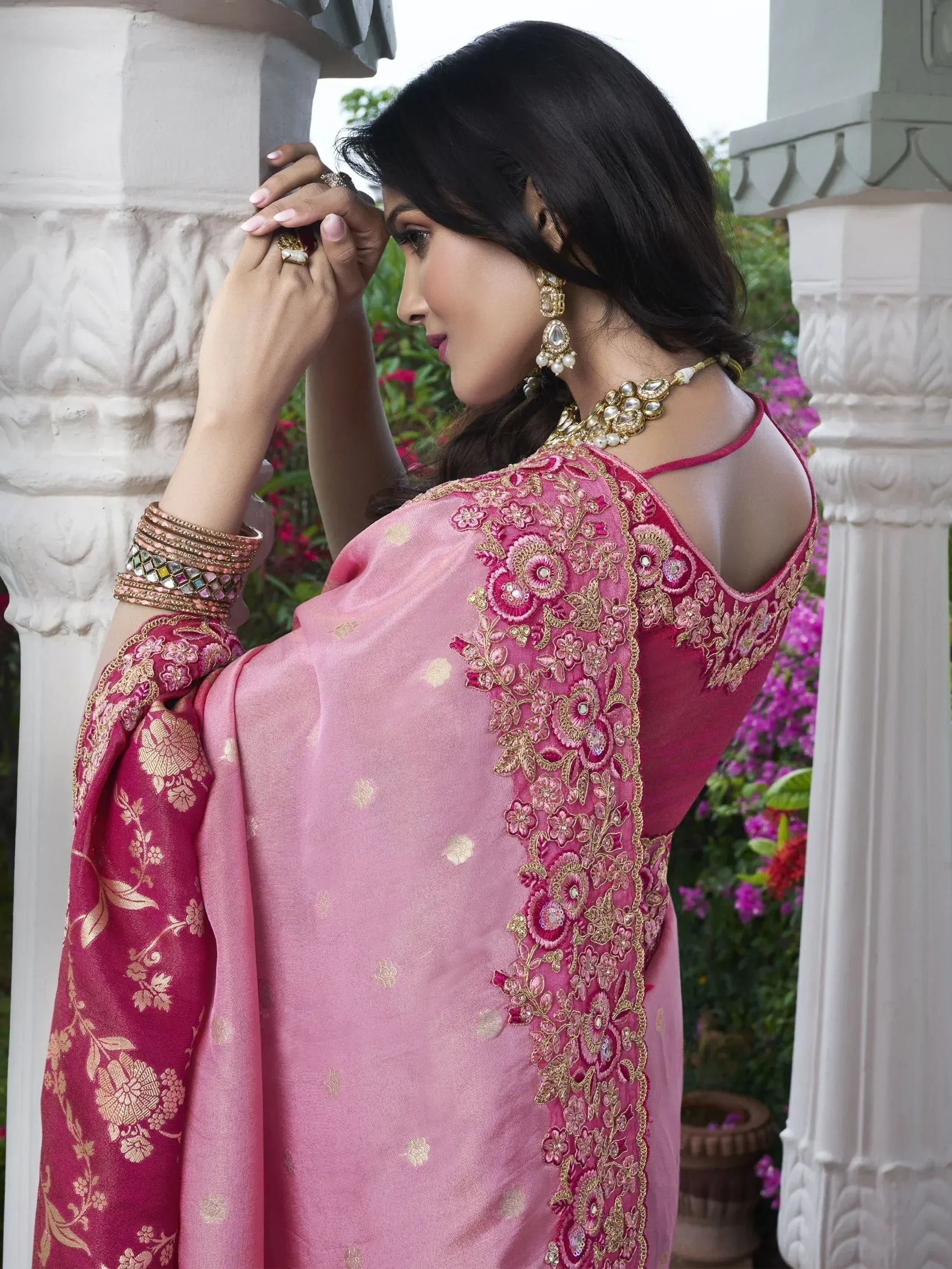 Pink embroidered designer salwar kameez with gold floral work, perfect for Indian ethnic occasions