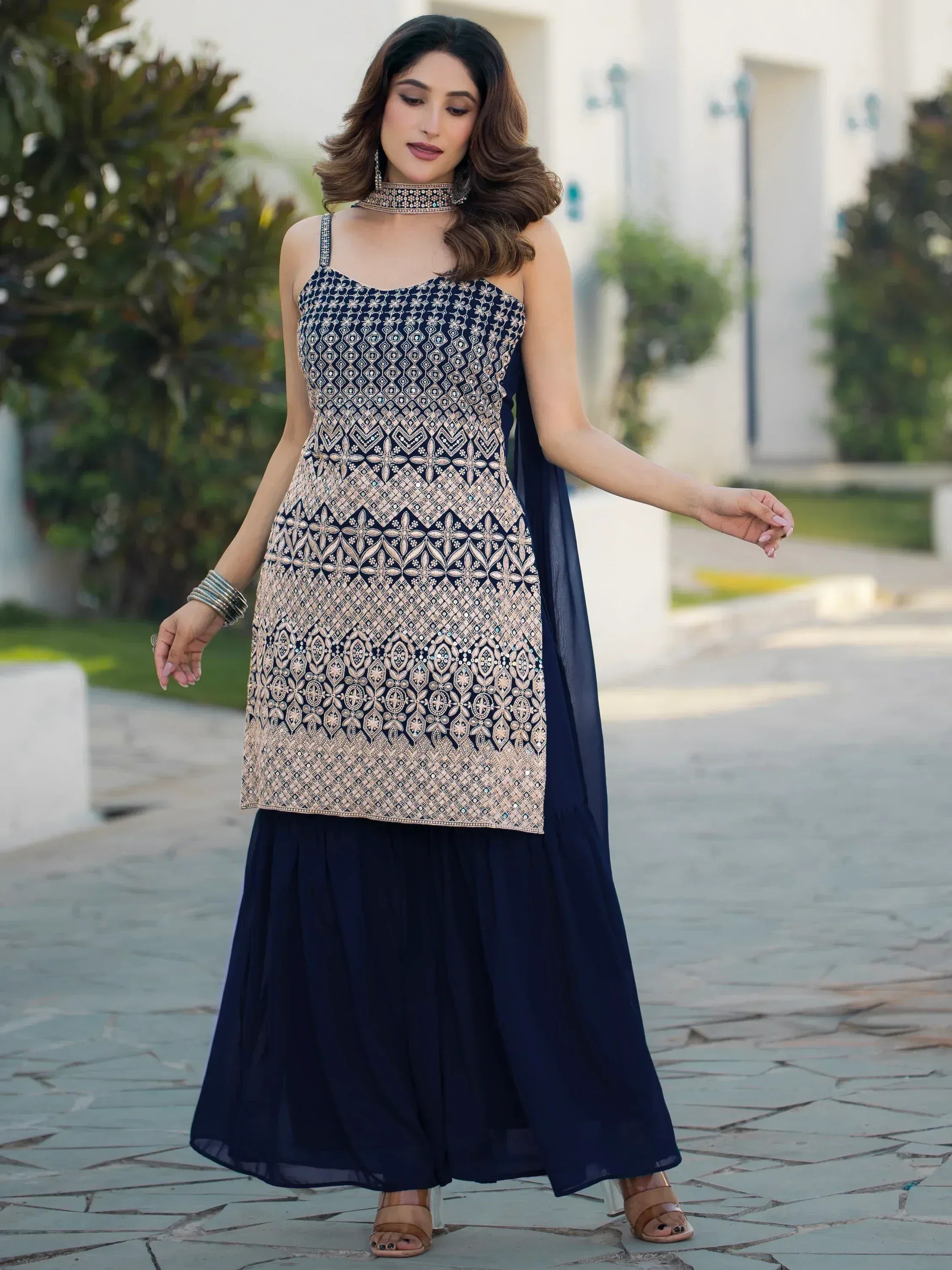 Elegant navy blue ethnic gown with intricate gold embroidery and matching dupatta for women
