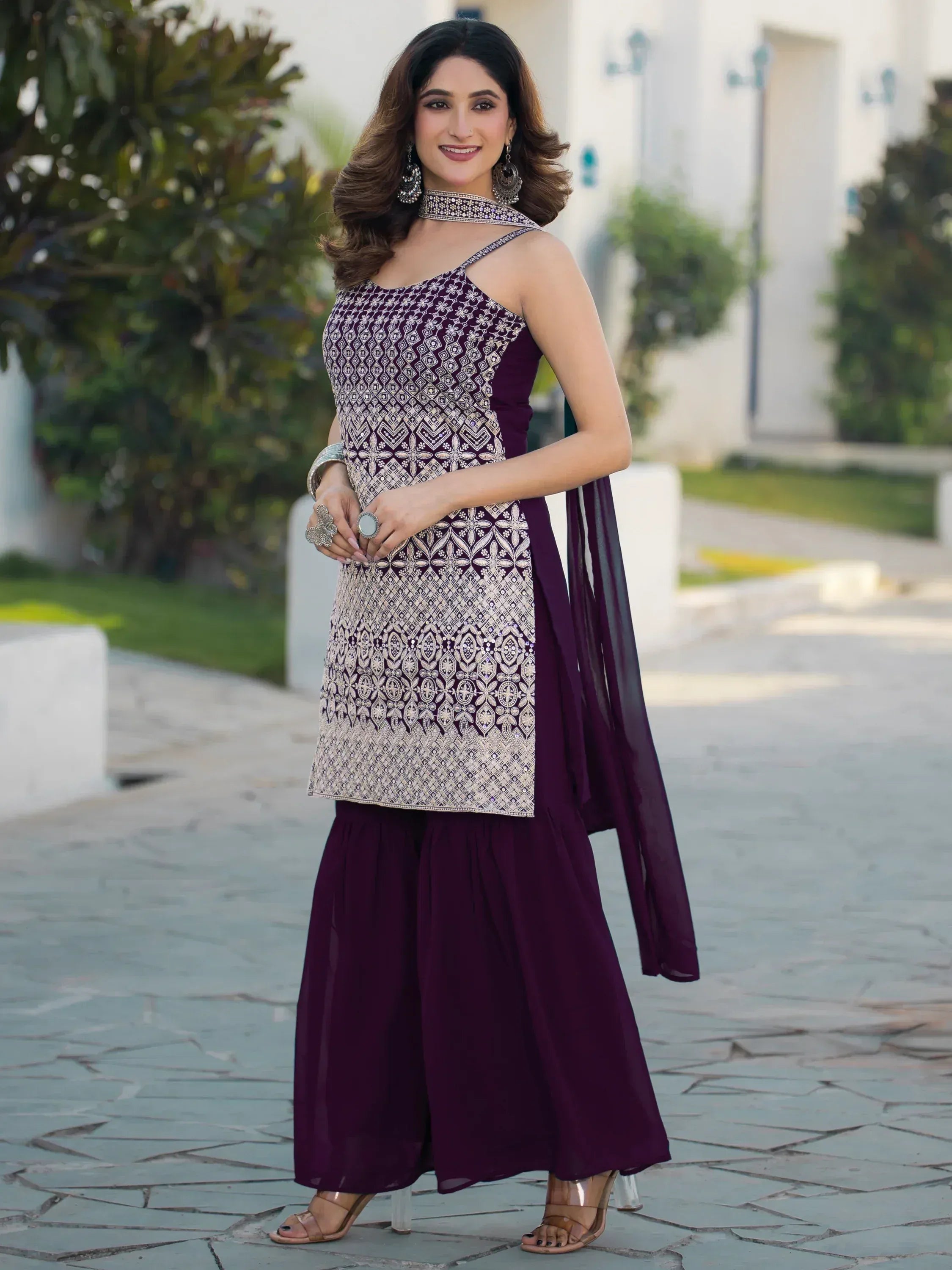Elegant purple ethnic gown with intricate embroidery and matching palazzo pants