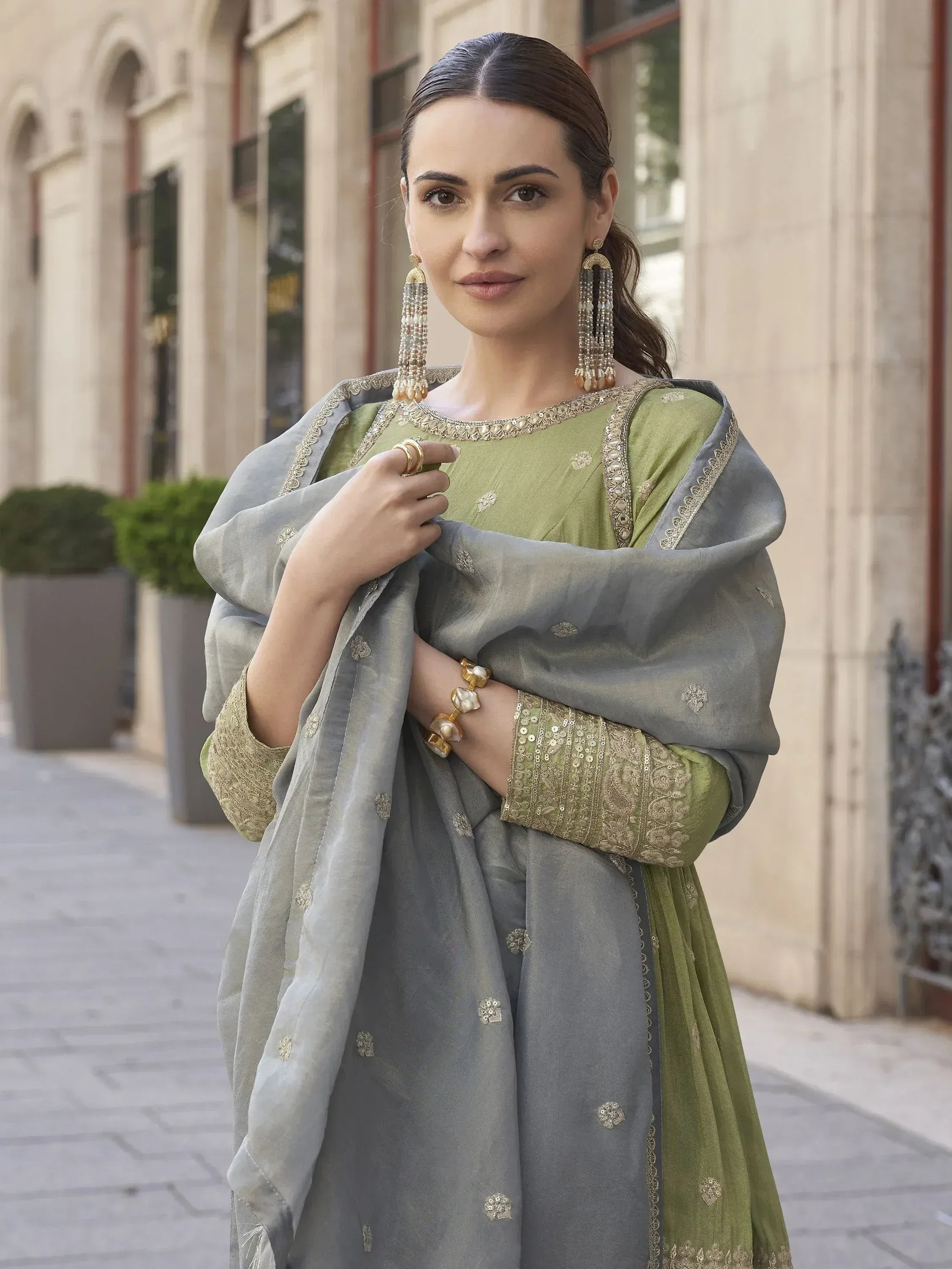 Elegant green and grey embroidered salwar kameez with gold detailing, perfect for Indian ethnic wear