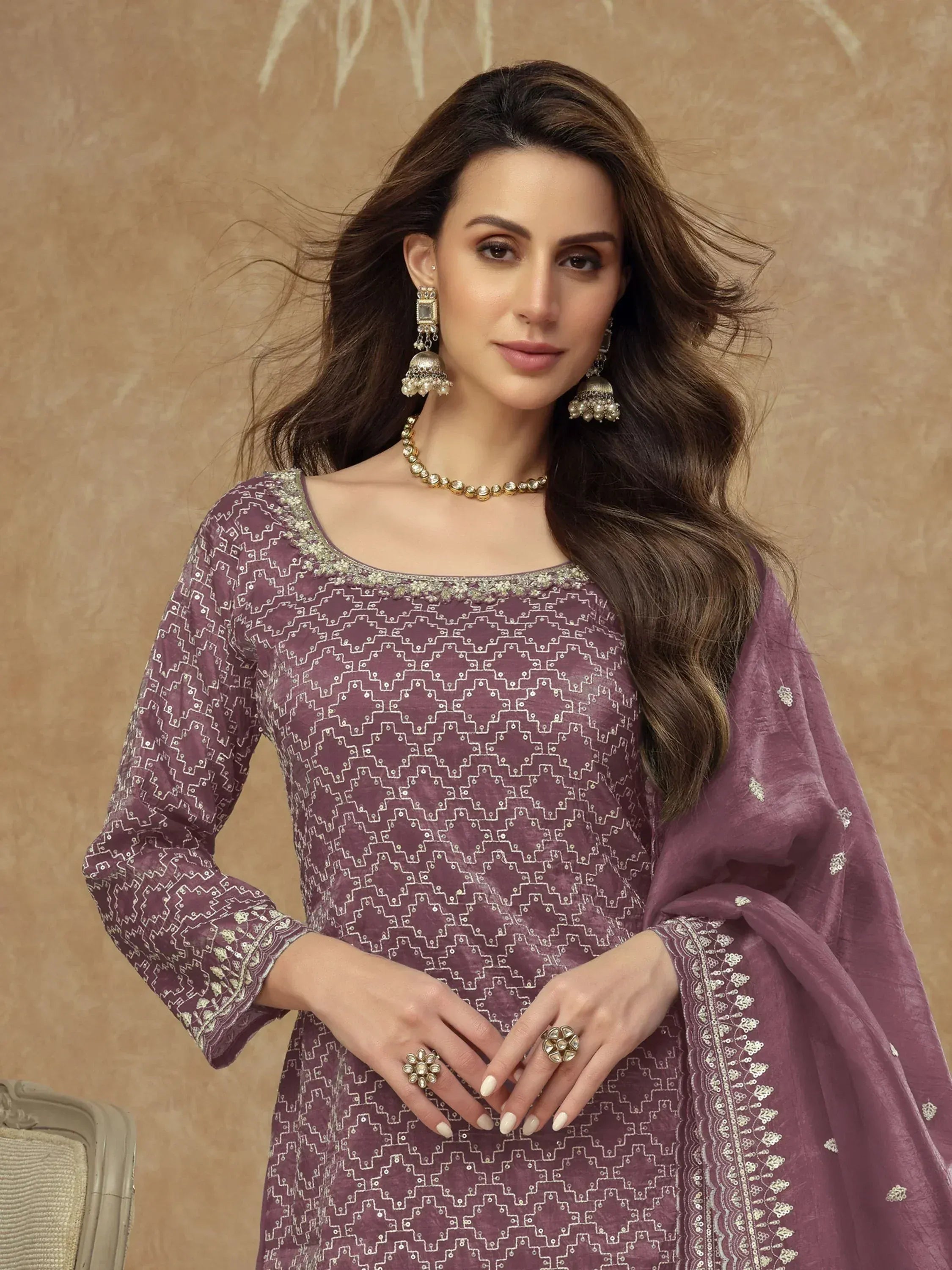 Elegant purple embroidered salwar kameez with geometric pattern, perfect for festive occasions