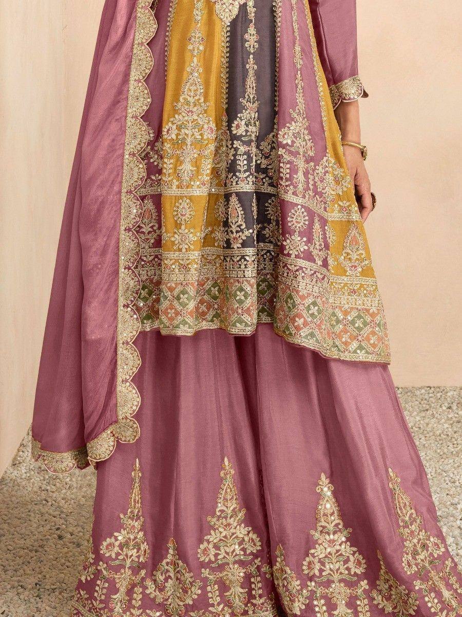 Elegant mauve lehenga choli with gold embroidery and matching dupatta, perfect for Indian ethnic occasions.