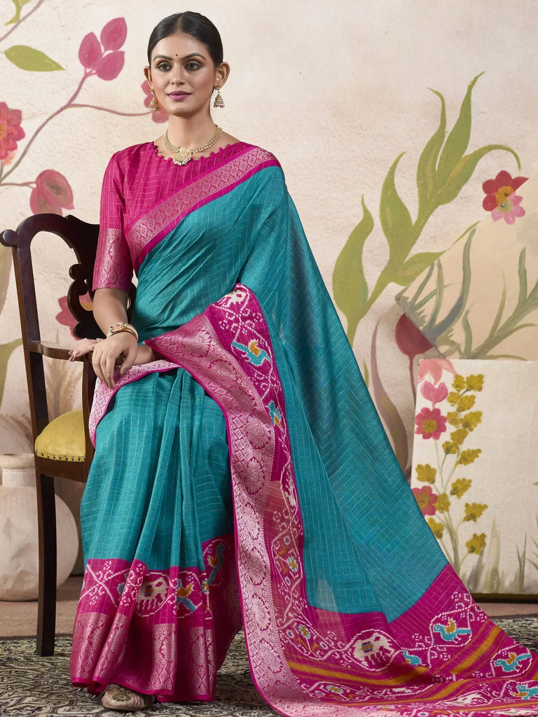 Bewitching Firozi Blue Patola Printed Tussar Silk Festival Wear Saree