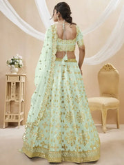 Mesmerizing Pista Embroidered Art Silk Reception Wear Lehenga Choli