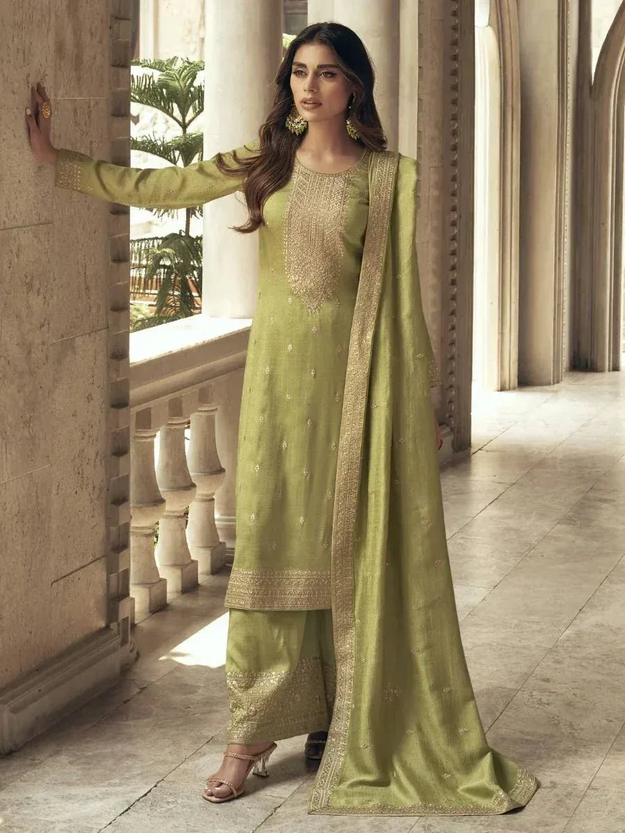 Olive green embroidered salwar kameez with gold detailing, perfect for ethnic occasions