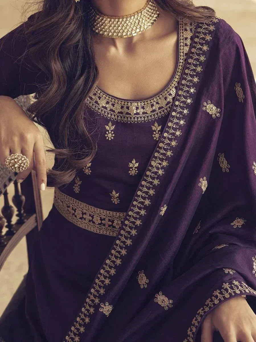 Elegant purple salwar kameez with gold embroidery, perfect for Indian ethnic wear occasions.