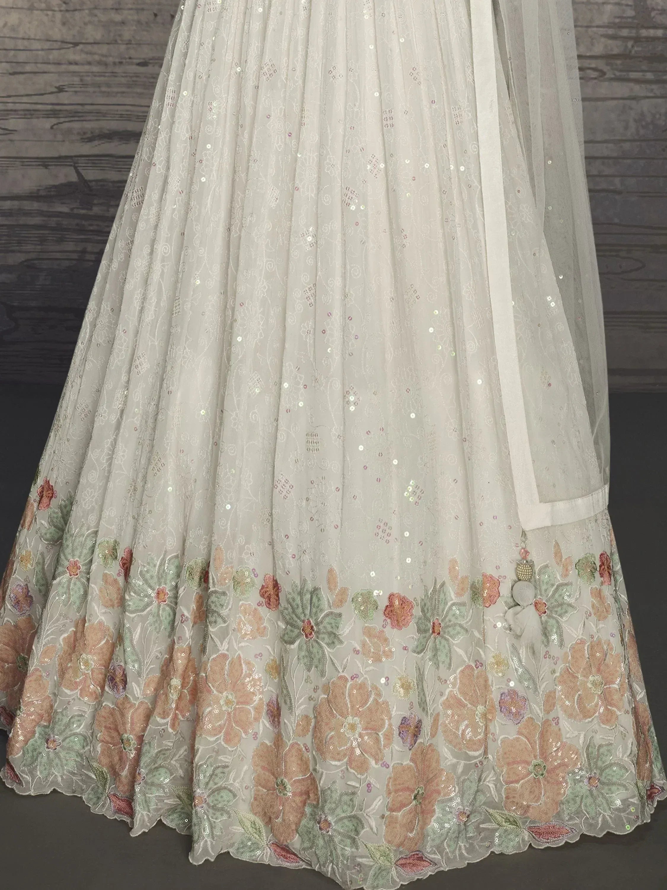 White floral embroidered lehenga with sequins and pastel flowers, Indian ethnic wear