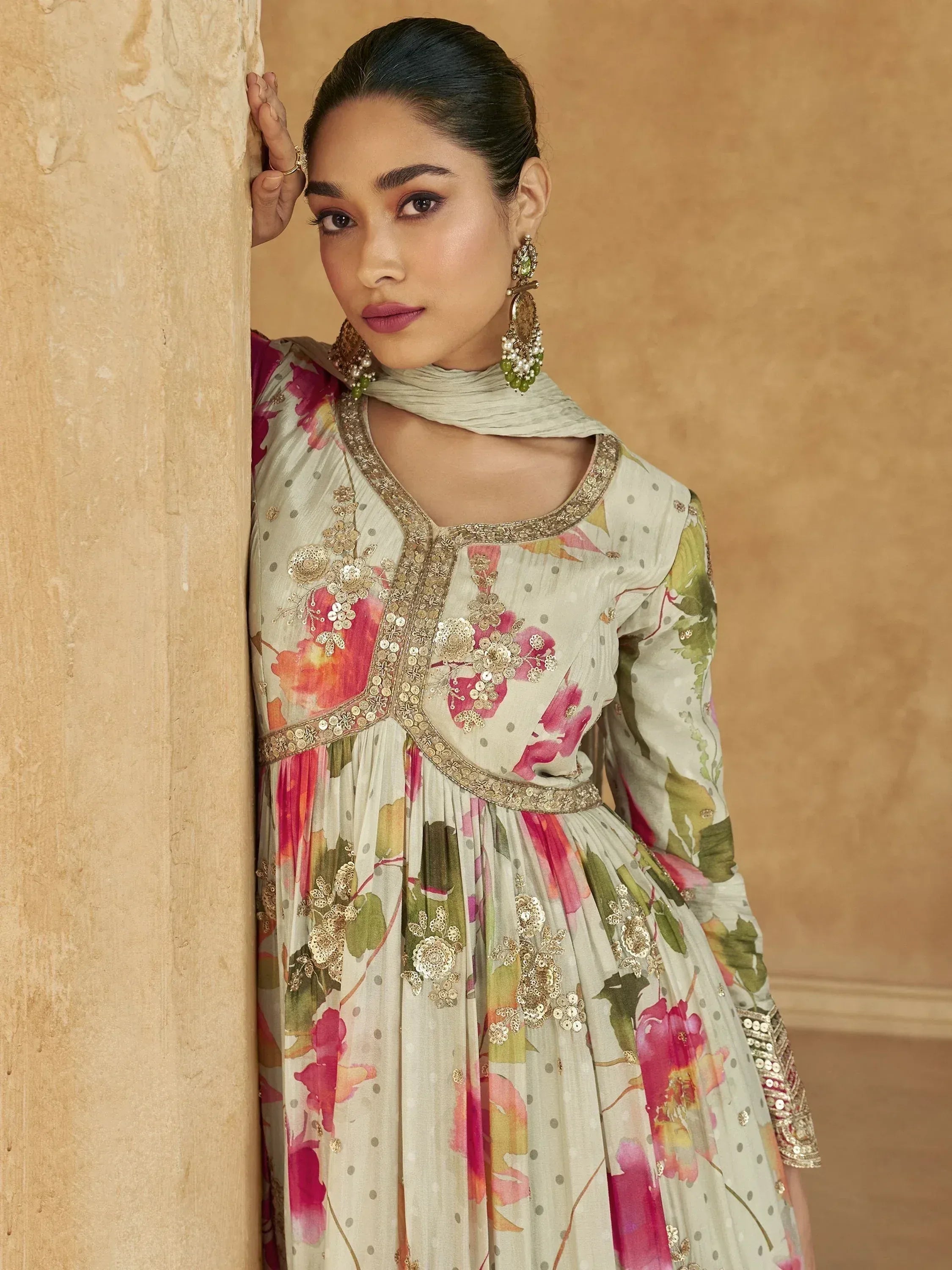 Floral embroidered ethnic gown with gold detailing and matching dupatta