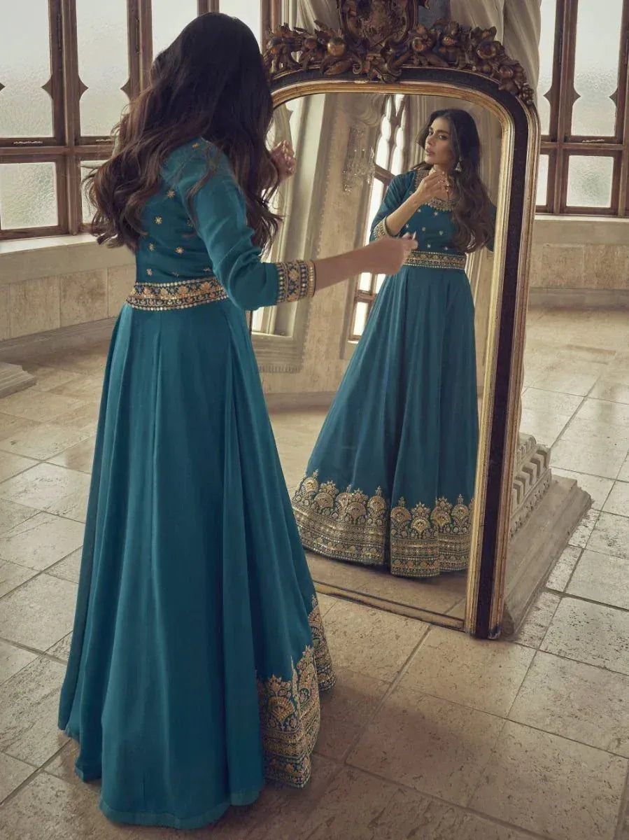 Teal ethnic gown with gold embroidery, mirror reflection, designer Indian wear