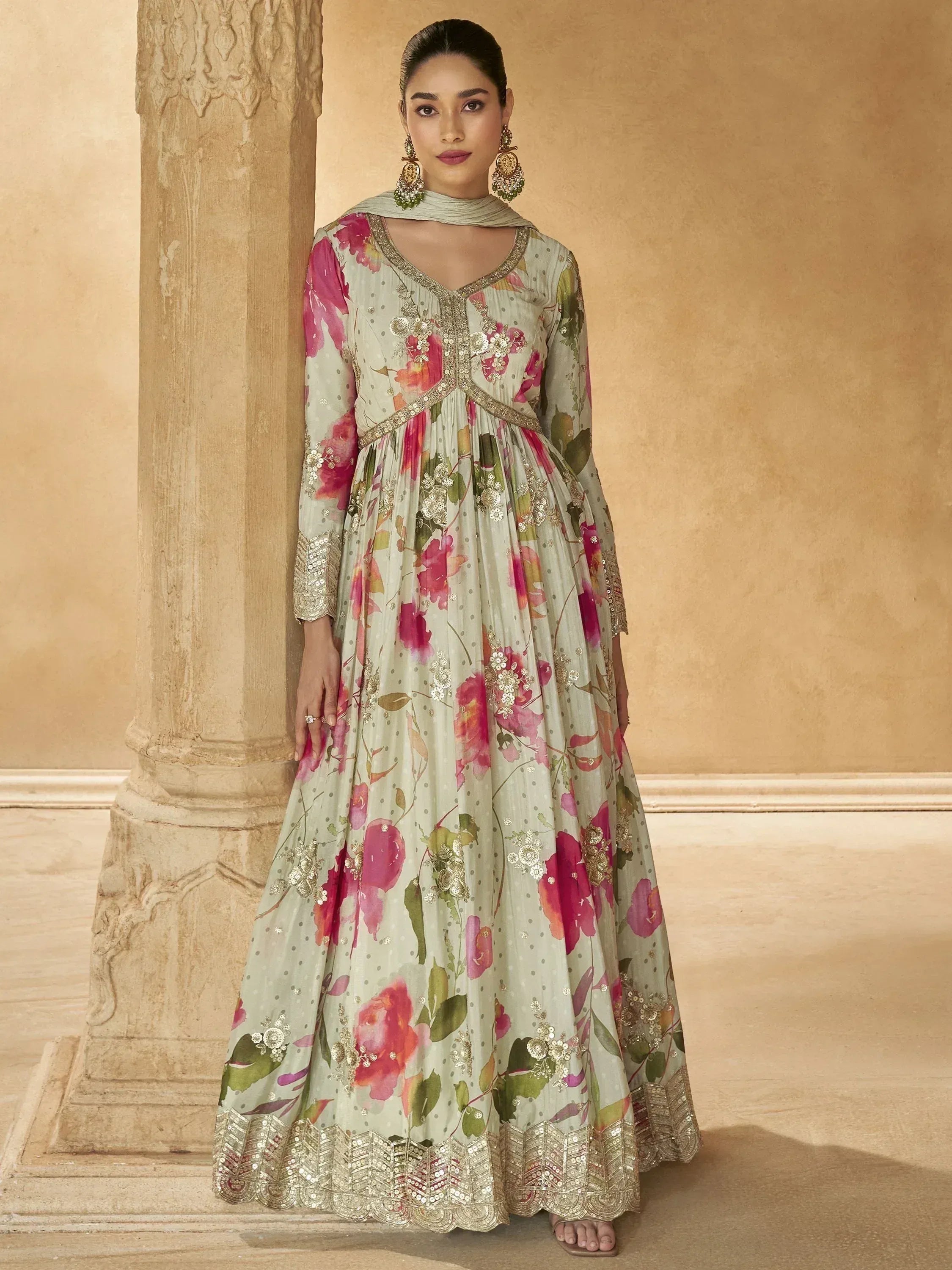 Elegant floral printed anarkali gown with gold embroidery, perfect for Indian ethnic wear occasions.