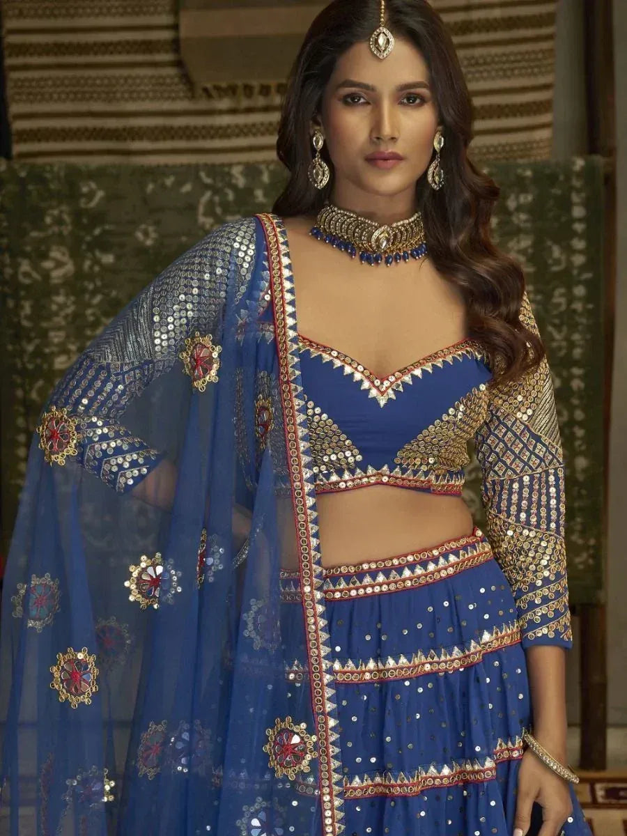 Blue sequin lehenga choli with gold embroidery, perfect for Indian ethnic wear and festive occasions